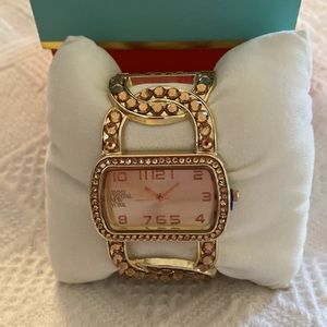 Jimmy Crystal Gold with Gold Swarovski Crystals, cuff bracelet style. No battery